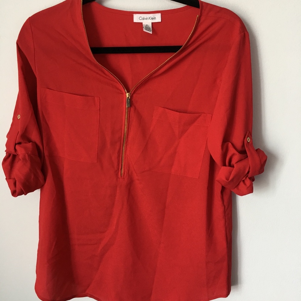 Red Calvin Klein zippered blouse, size small